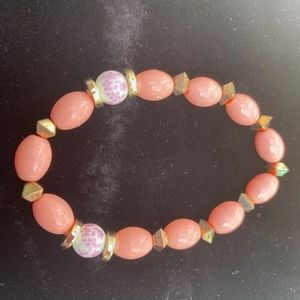 3/10 pink studded bracelet